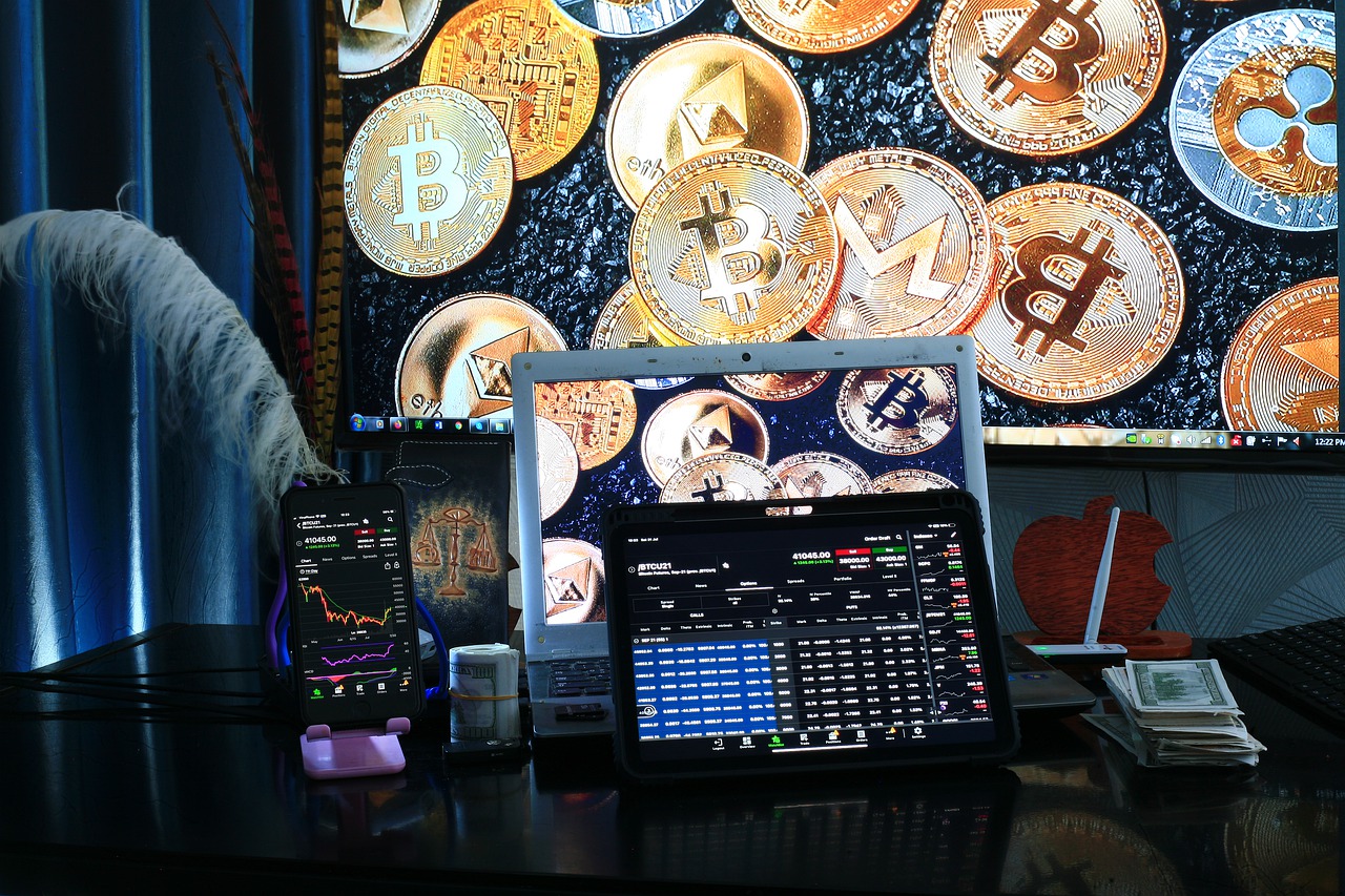 multiple cryptocurrency coins with a trading desk and money and displays showing a day trader making money off the markets.