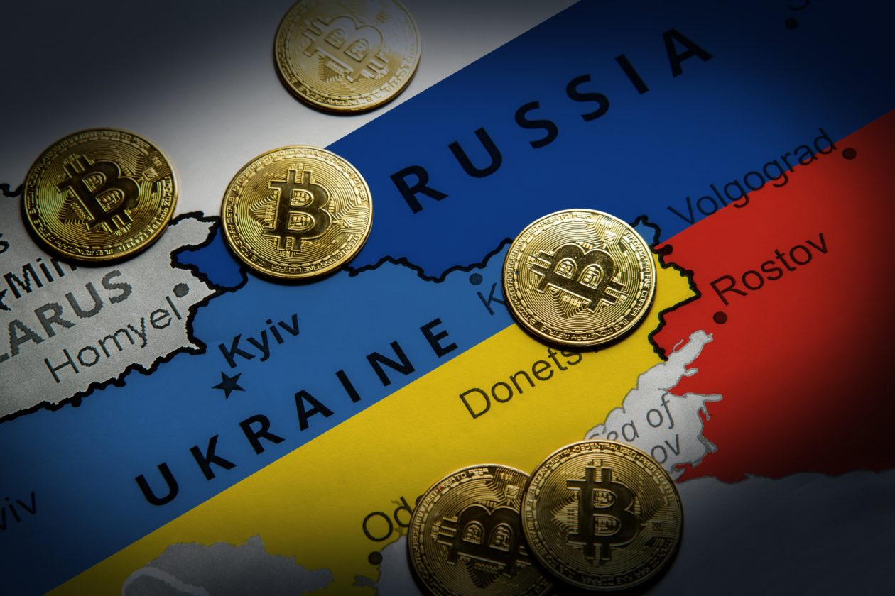 map of Ukraine and Russia and bitcoin on their border, Crypto is playing a prominent role in the Ukraine War — on both sides of the conflict